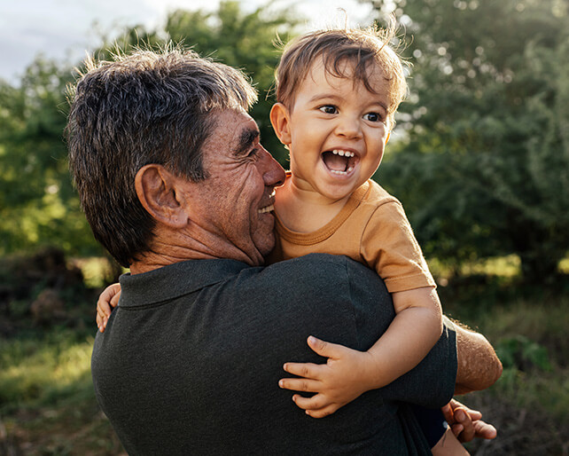 Man Hugging His Grandson